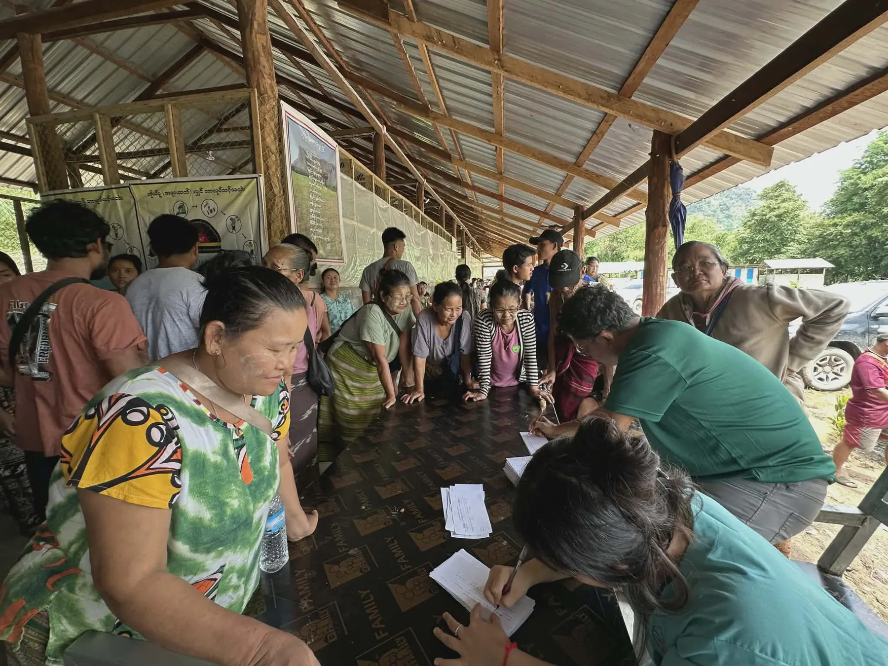 Community members registering for eye care