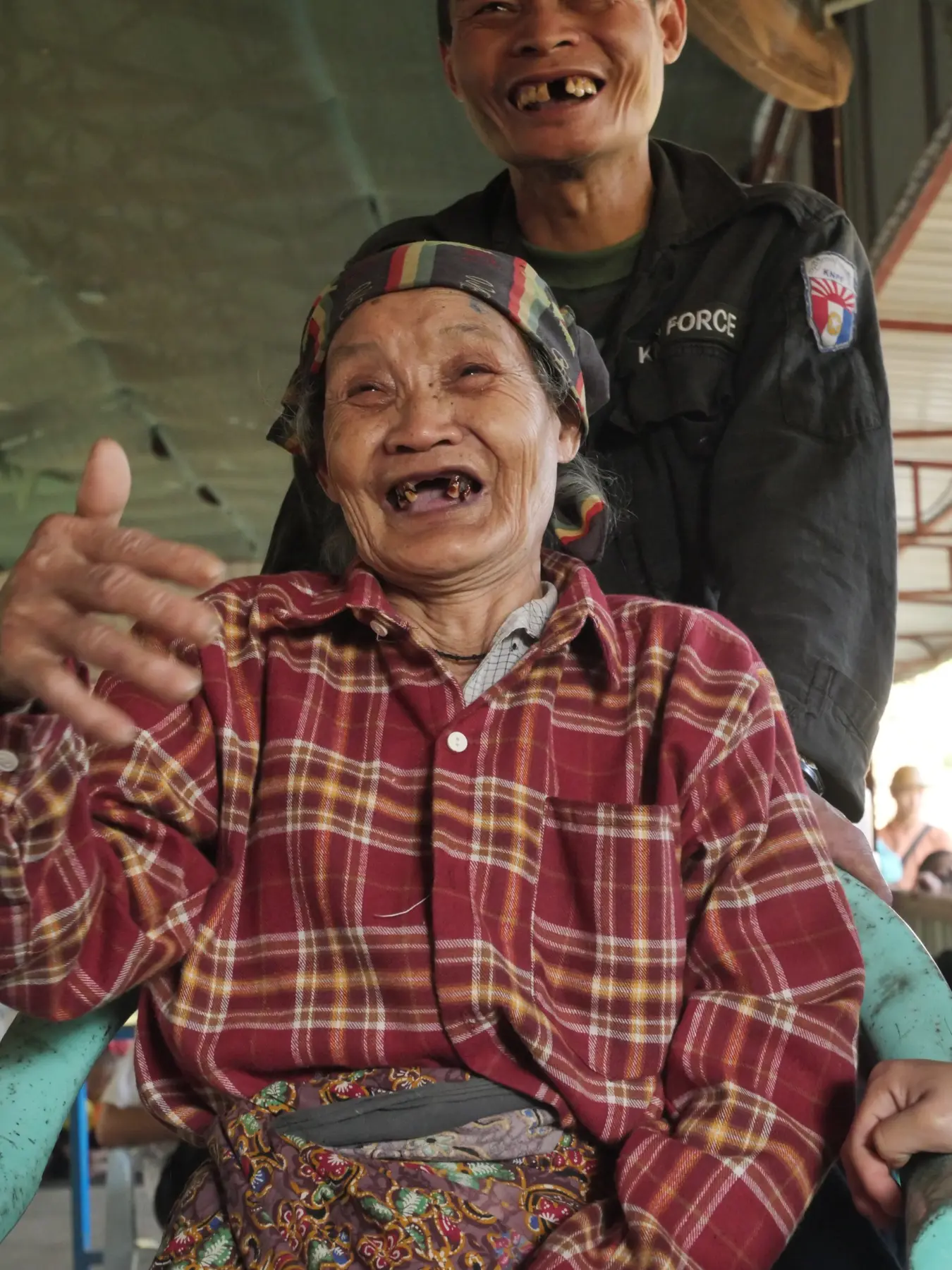 A patient smiling after receiving eye care