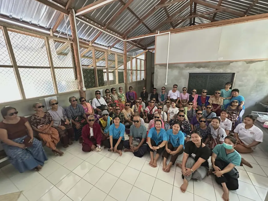 Patients, volunteers, and healthcare professionals gathered during a Mobile Eye Mission